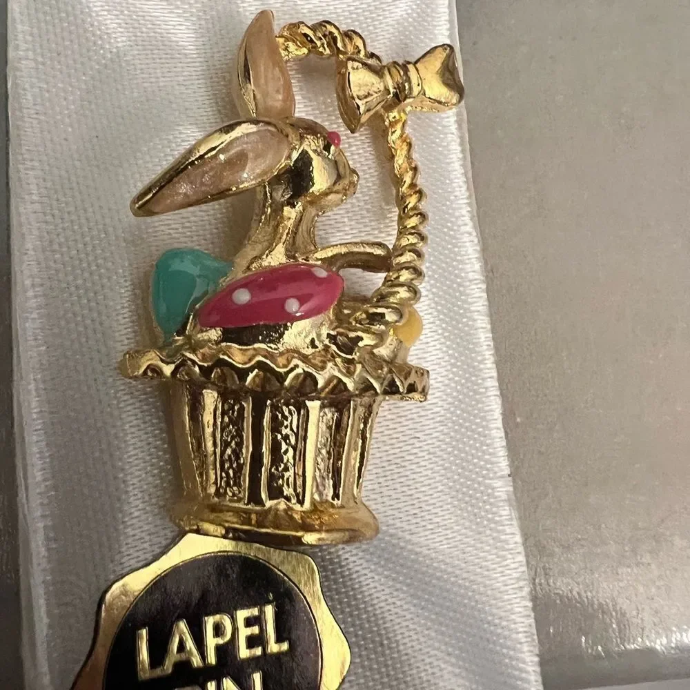 Gold tone Easter Bunny in Basket vintage lapel pin.